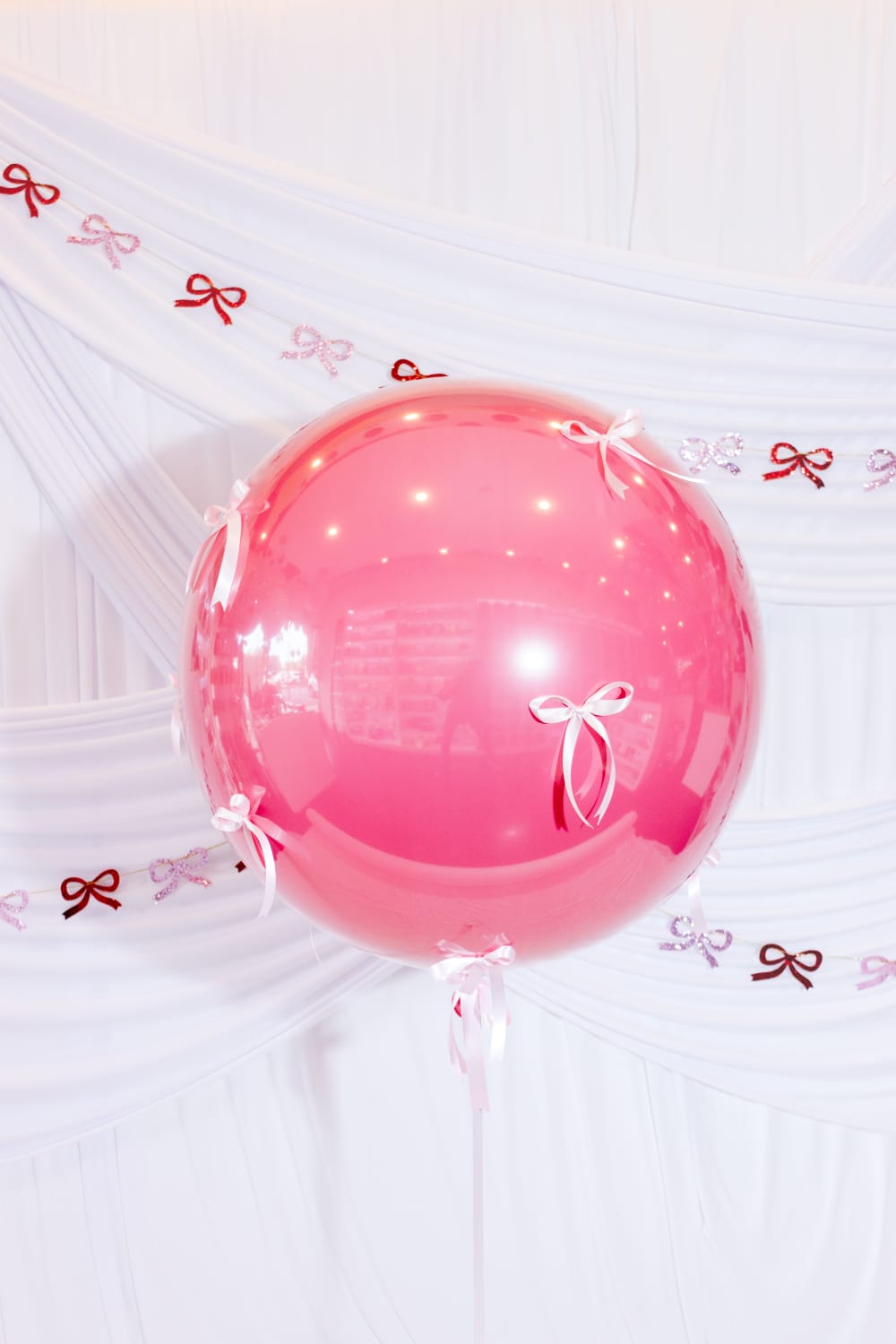 Burbuja moños rosas